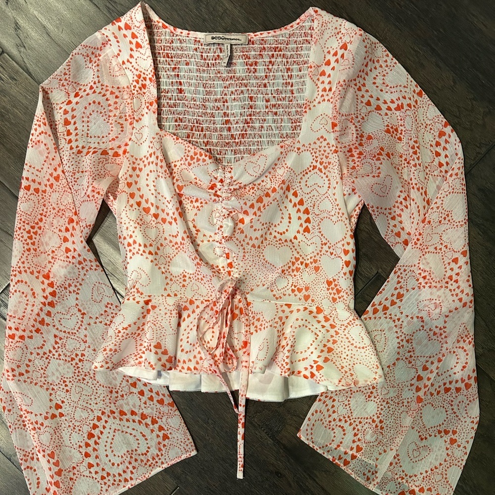 BCBGeneration White and Orange Heart Print Peplum Blouse